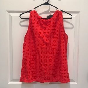 Cynthia Rowley, small. Orange sleeveless shirt with buttons in back